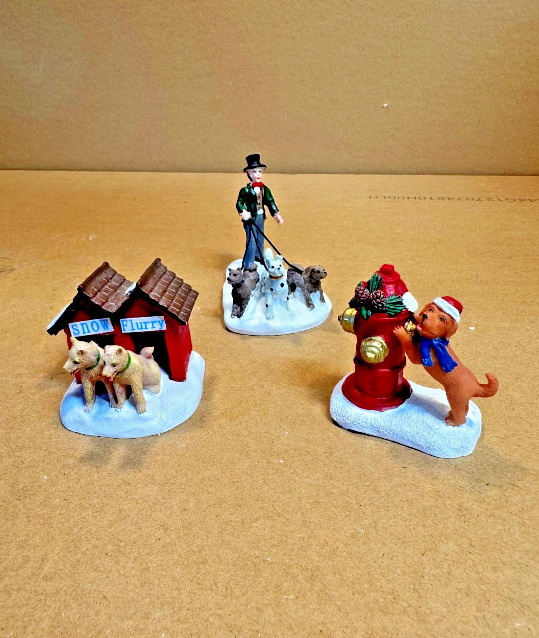 Lot Of 3 Miniature Christmas Village PiecesDogs man w/top hat BOW WOW WOOF. Lot Of 3 Miniature Christmas Village PiecesDogs man w/top hat BOW WOW WOOF.