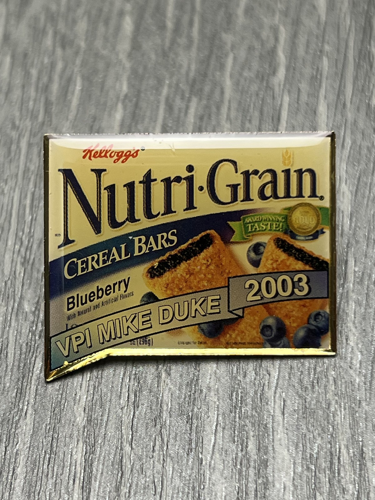 Kellogg\'s Nutri-Grain Blueberry Cereal Bar Advertising Pin VPI Mike Duke 2003 Kellogg\'s Nutri-Grain Blueberry Cereal Bar Advertising Pin VPI Mike Duke 2003
