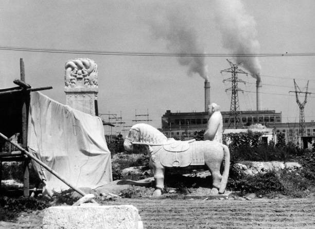 Ancient statues abandoned in an industrial district China 1960s Old Photo
