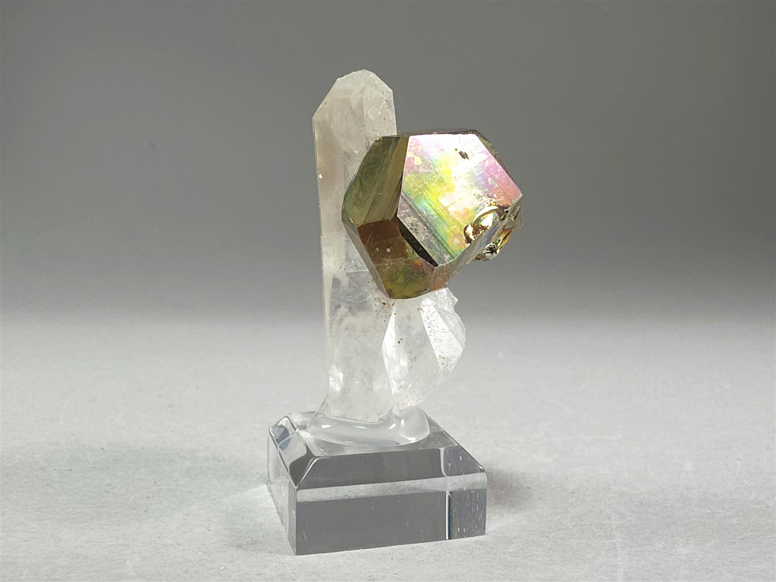 Natural Iridescent Rainbow Pyrite Crystal perched on Quartz 