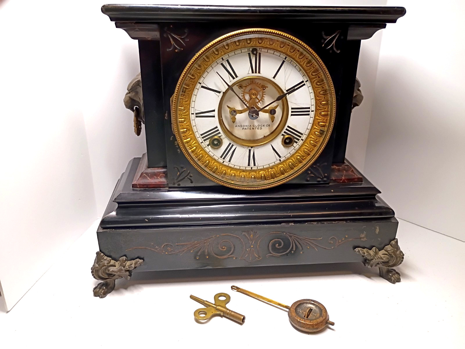 Antique Ansonia Black Iron Open Escapement Mantle Clock Lions Head Runs Strikes