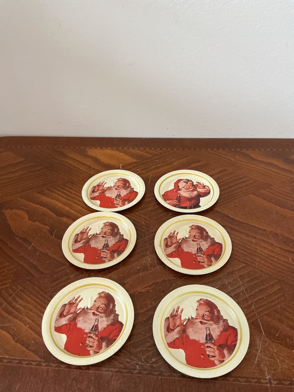 6-vintage Coca-Cola Santa Claus metal coasters from the early 1980s
