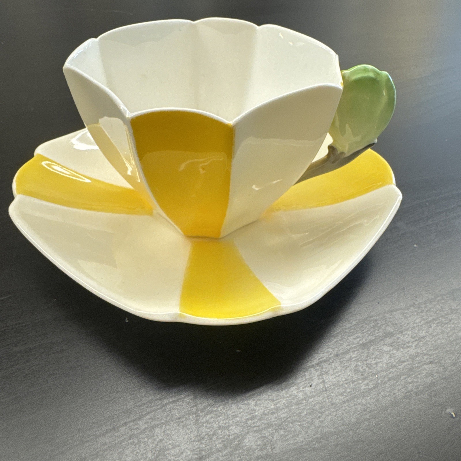 Shelley Yellow Star (Harlequin) 1932  Tulip Handle  teacup and saucer set. 12109