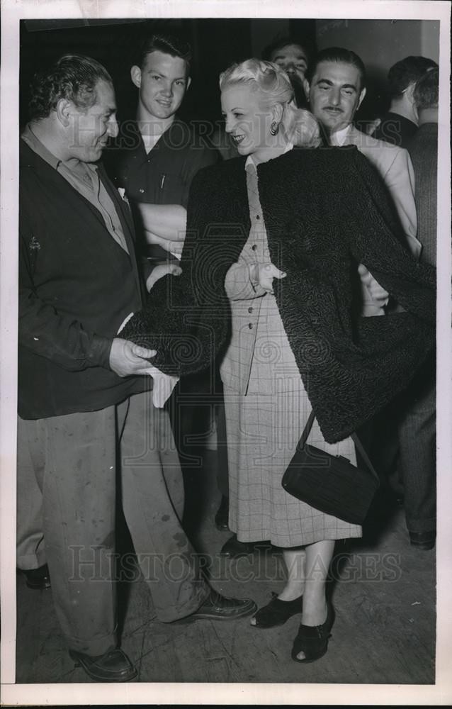 1953 Press Photo Charles Scala and wife fell in love with Persian Lamb Coat
