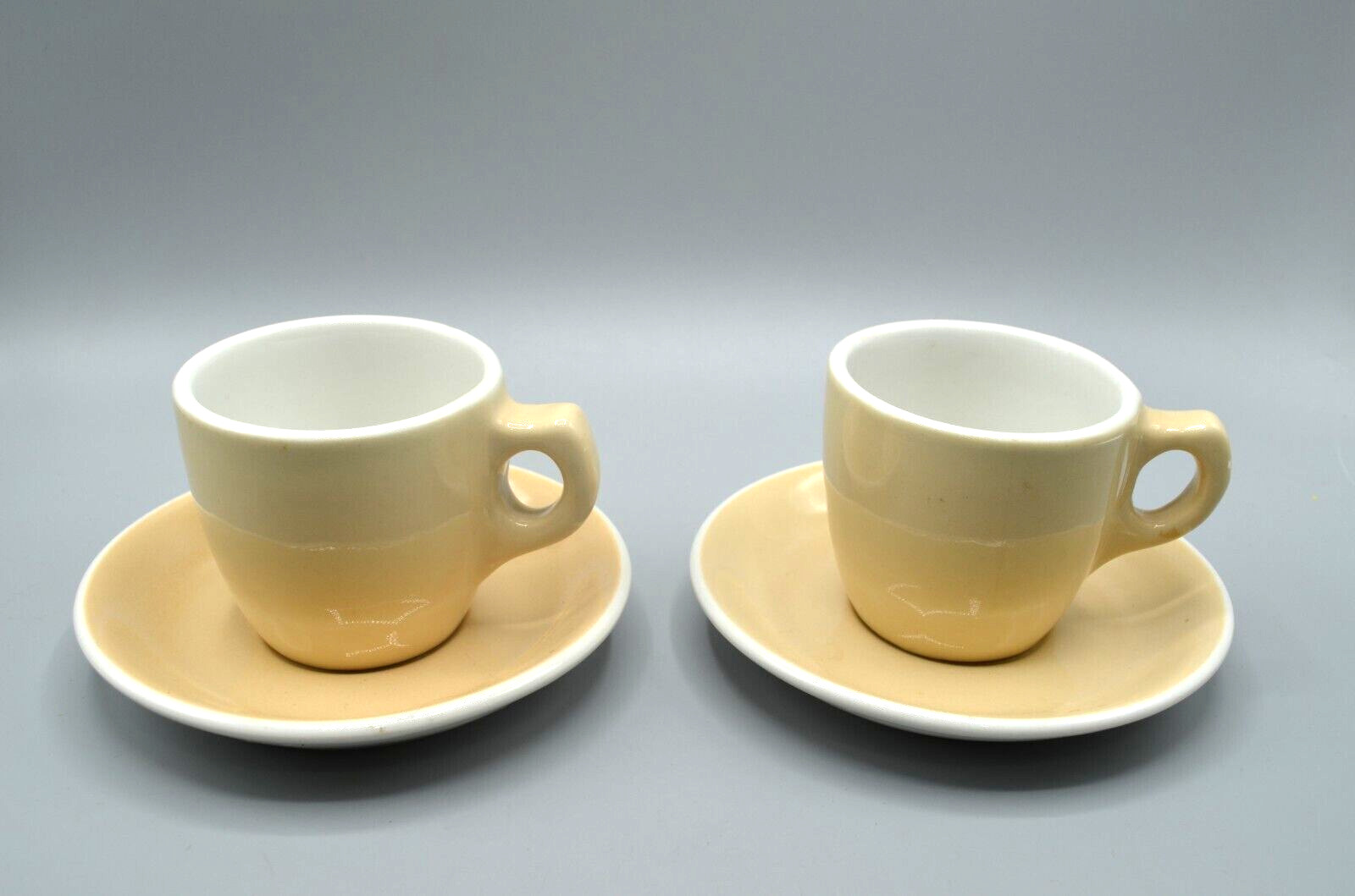 Medalta Coffee Mugs Set of 2 Cups Saucers Light Yellow 1950s Ceramic Canada Vtg