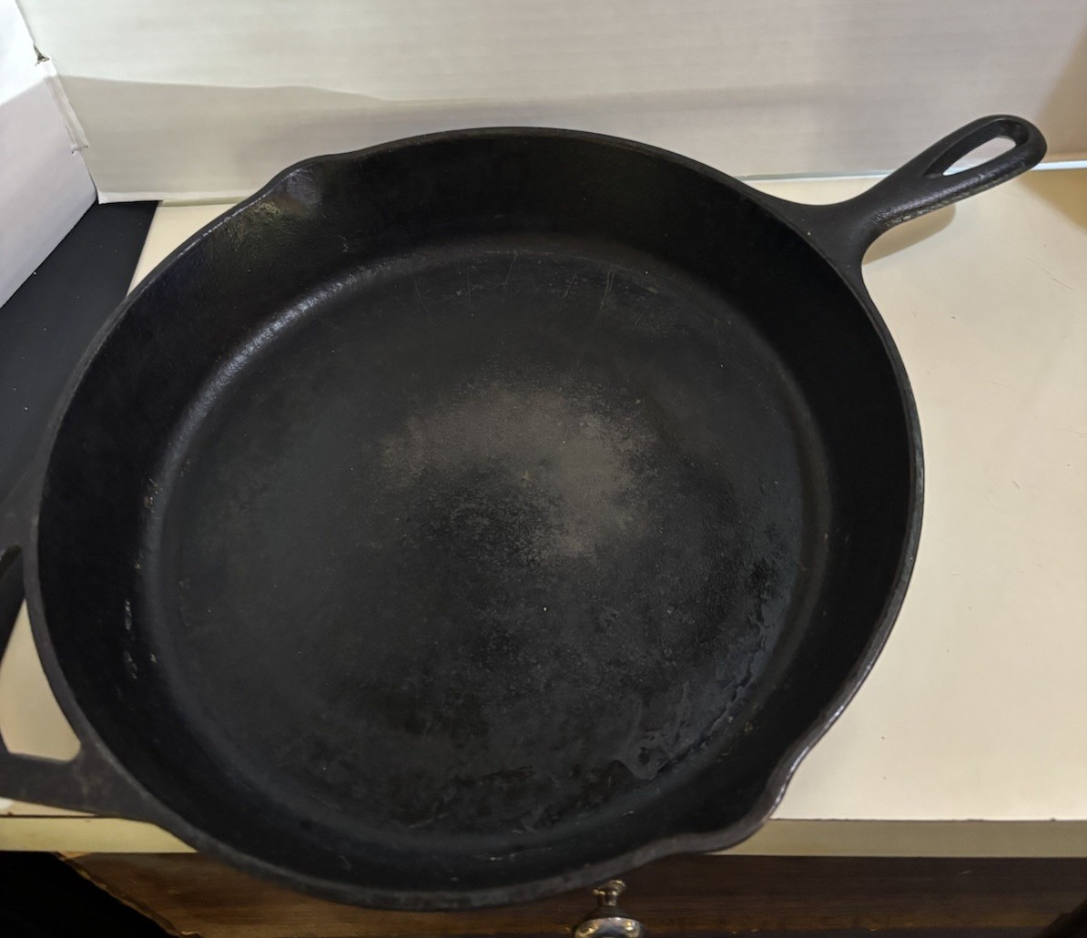 This item is a Lodge Cast Iron Skillet, specifically identified as a Vintage 12”