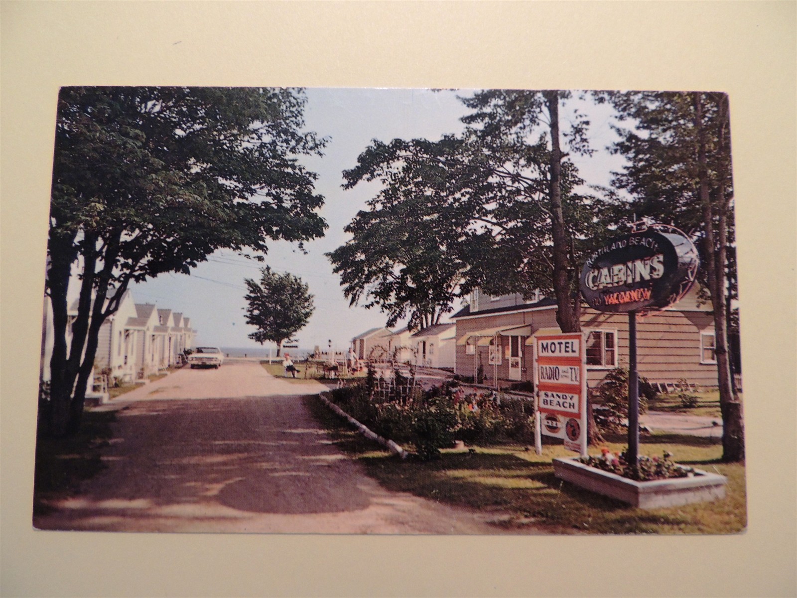 Northland Beach Cabins East Tawas Michigan vintage postcard 1965