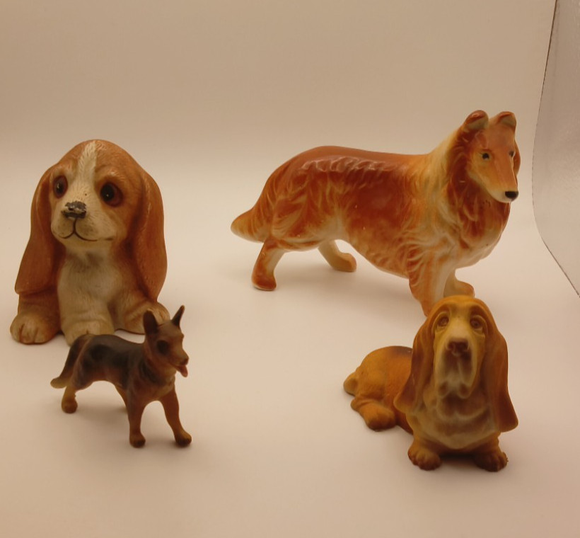 Vintage Dog figurine lot of 4 various sizes Used excellent condition