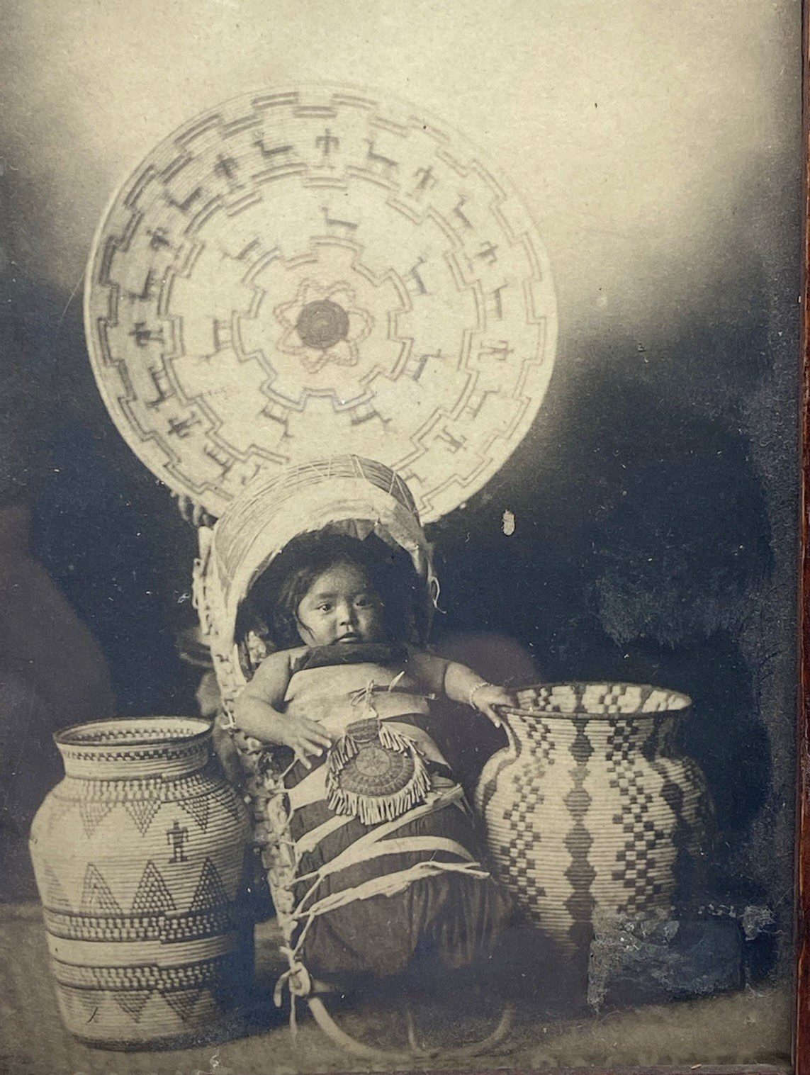 Old Photo of Apache Young Child Native American Indian With Baskets In Frame