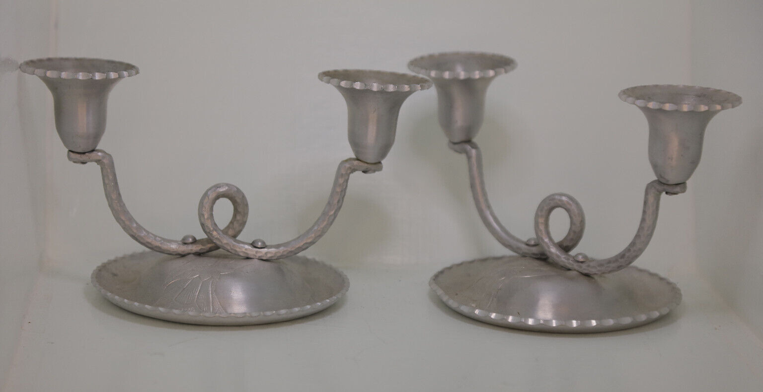Aluminum Farberware pair of candlestick holders wrought with a flower pattern