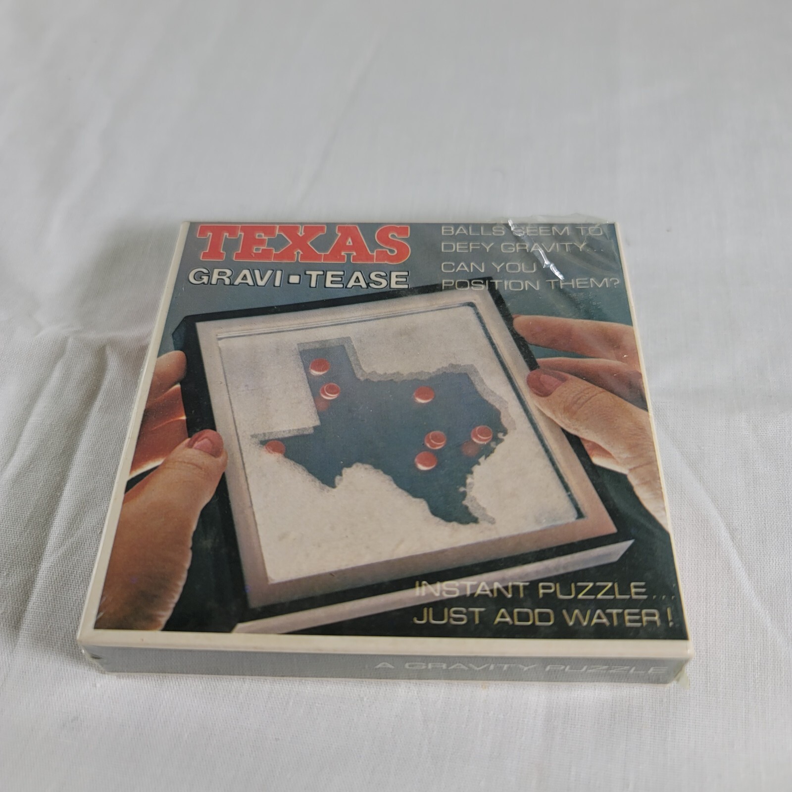 Original Vintage Puzzle: TEXAS GRAVI-TEASE -- SEALED just add water -- 1980