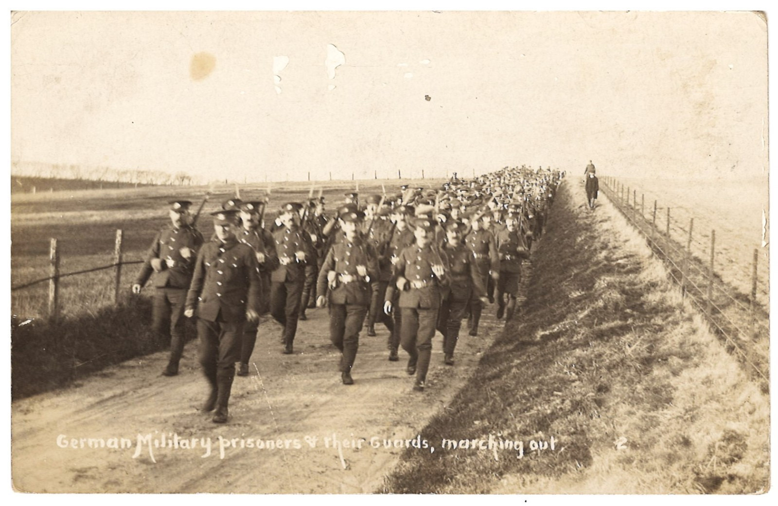 Real Photo: German Military Prisoners, Guards Marching Out . POWs.