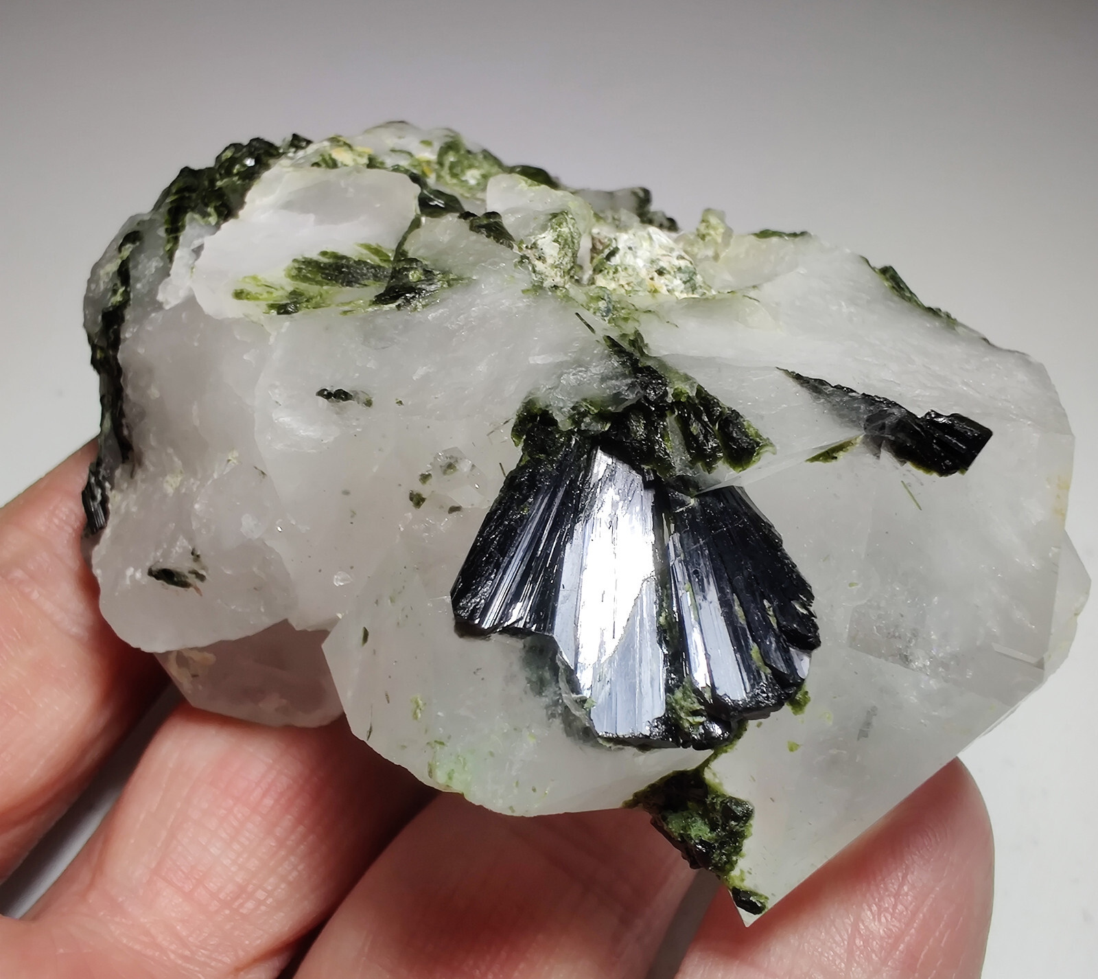 Epidote crystals on Quartz. Balochistan, Pakistan. 258 grams.
