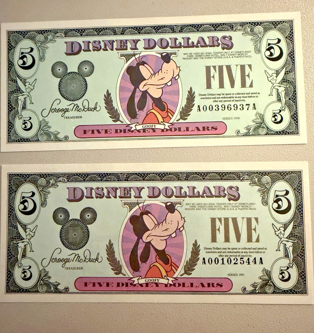 One 1993 & One 1998 $5 Disney Dollar Goofy Series AA Uncirculated-Used Envelope One 1993 & One 1998 $5 Disney Dollar Goofy Series AA Uncirculated-Used Envelope