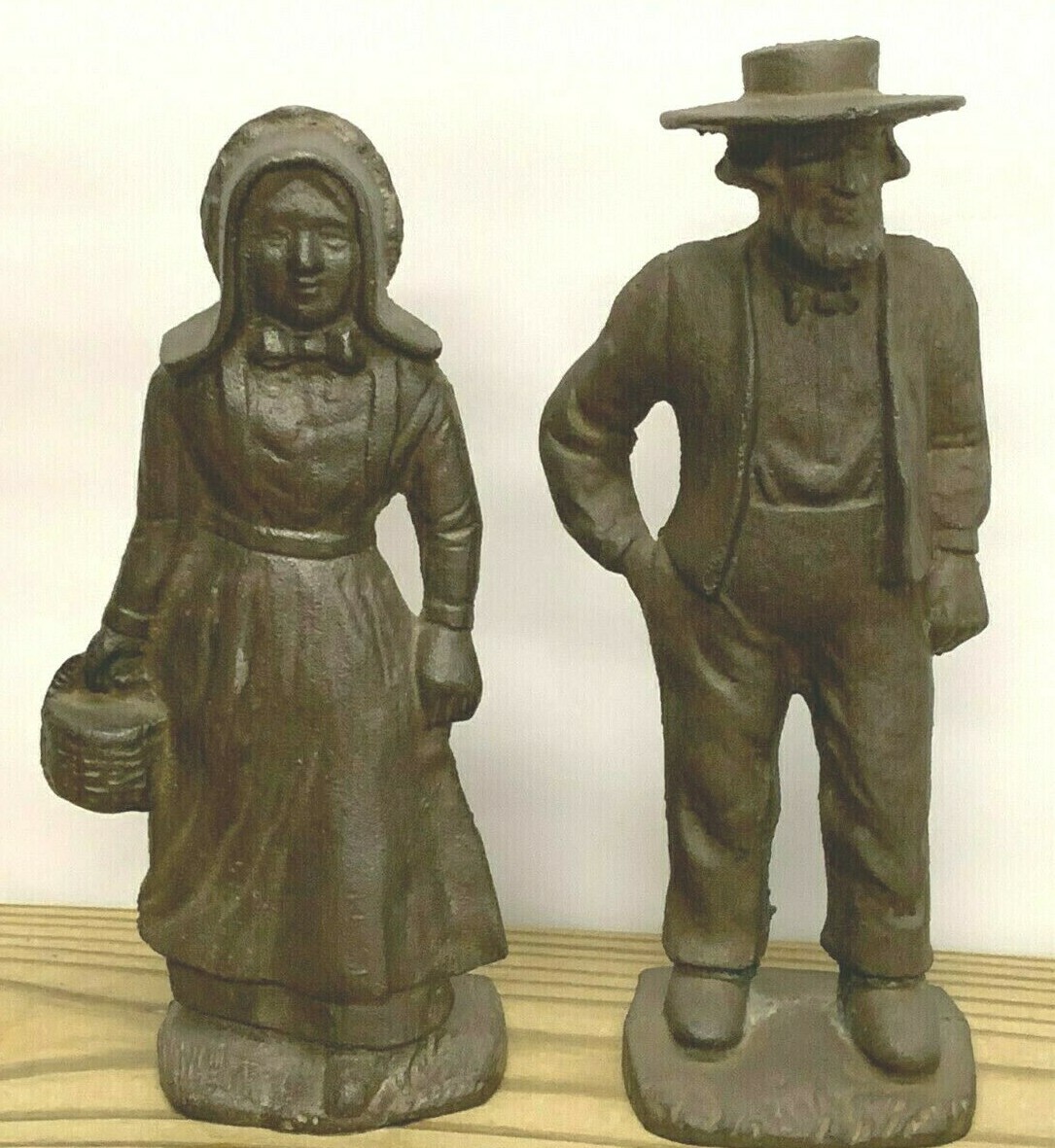 VTG ANTIQUE CAST IRON UNPAINTED FIGURAL DOORSTOP PAIR AMISH MAN & LADY       