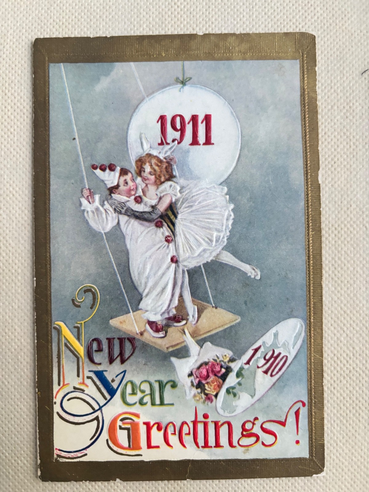 1911 New Year Greetings Embossed Pierrot Pierrette Clown Swing Antique Postcard