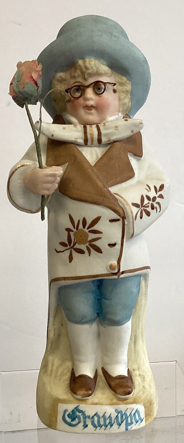 Antique German Grandpa Porcelain Bisque figurine holding Rose