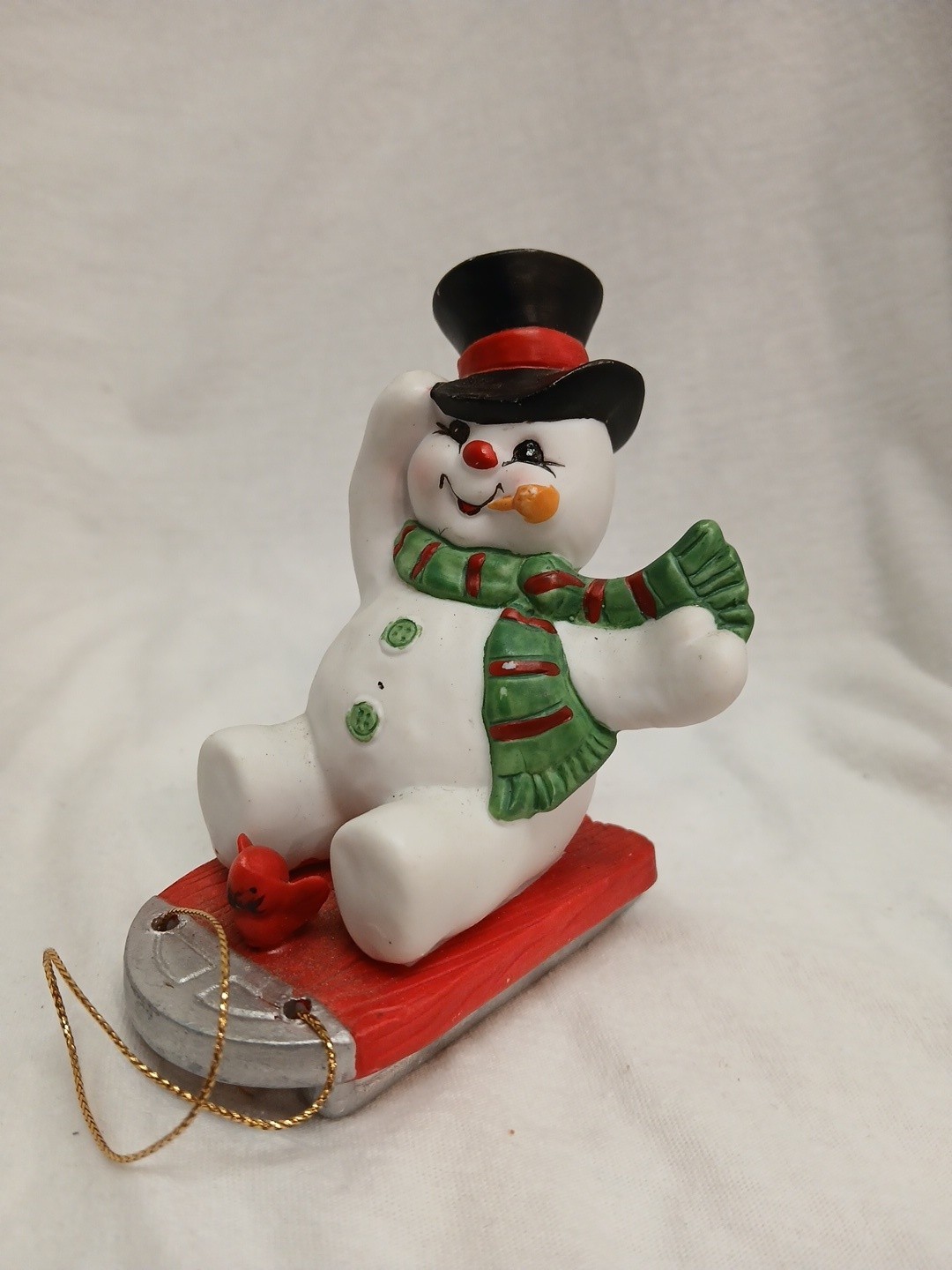 Vintage Enesco Frosty the Snowman on Sled with Cardinal Figurine, 1990