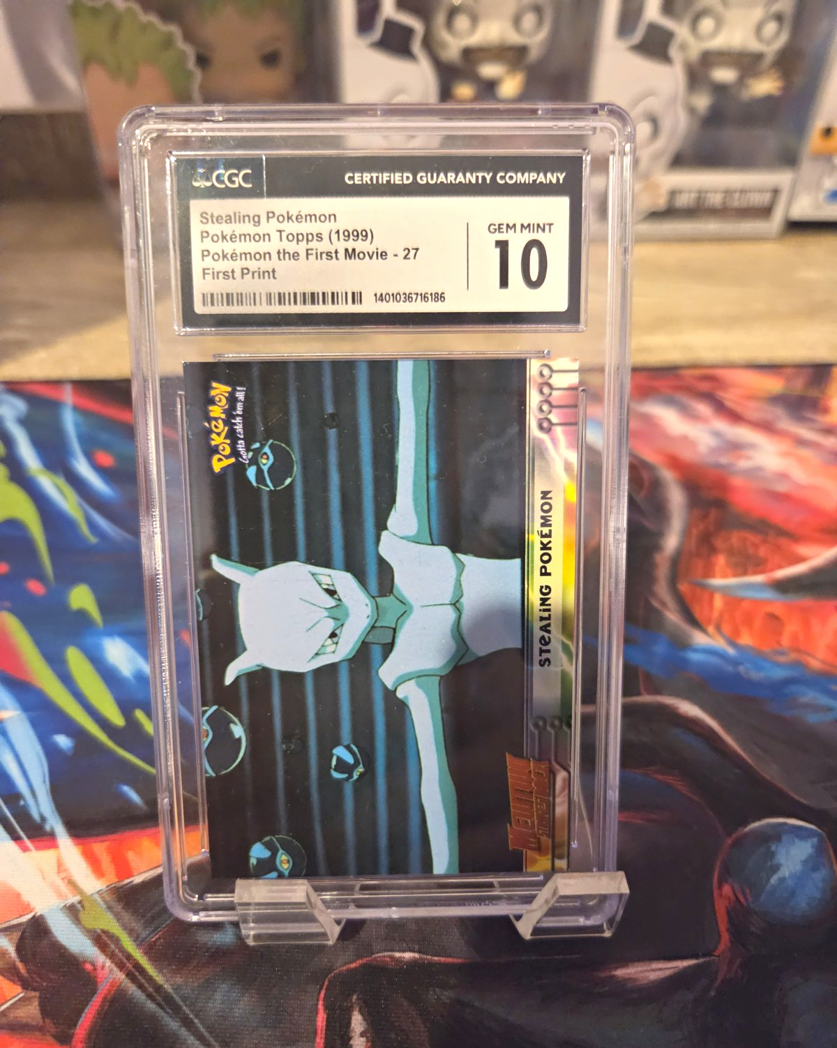 Topps 1999 Pokémon #27 Stealing Pokémon Mewtwo First Print CGC 10