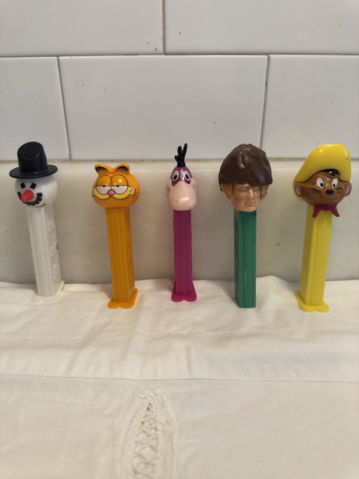 Vintage PEZ Dispenser Lot of 5 Daniel Boone - Austria, Garfield, Dino, Speedy Vintage PEZ Dispenser Lot of 5 Daniel Boone - Austria, Garfield, Dino, Speedy