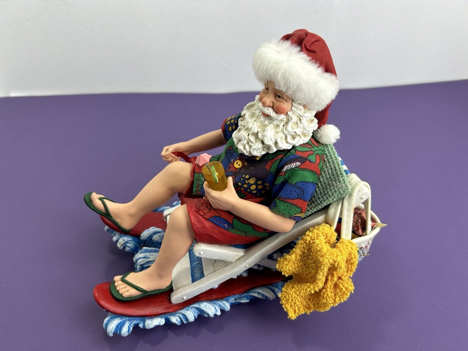Clothique Possible Dreams Santa On A Beach Chair Holding A Cocktail 