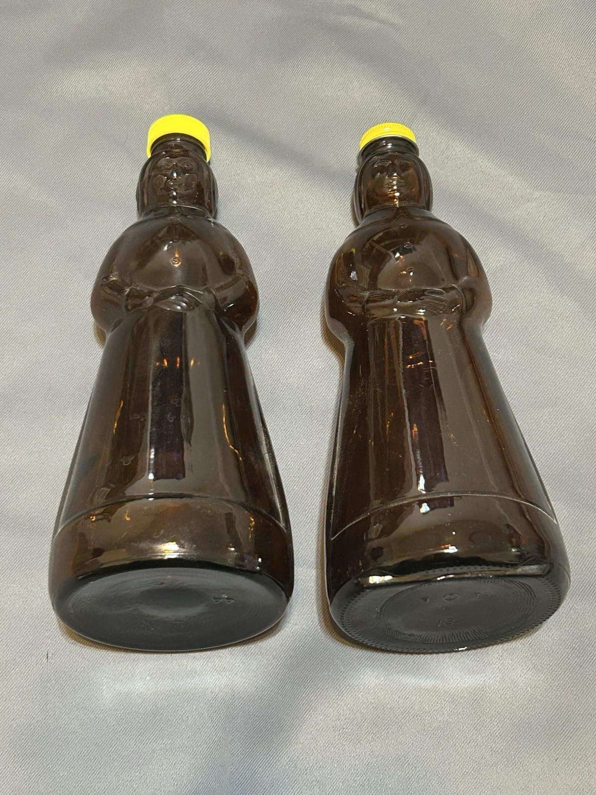 Two Vintage Mrs. Butterworth's Syrup Glass Bottles  W Cap.