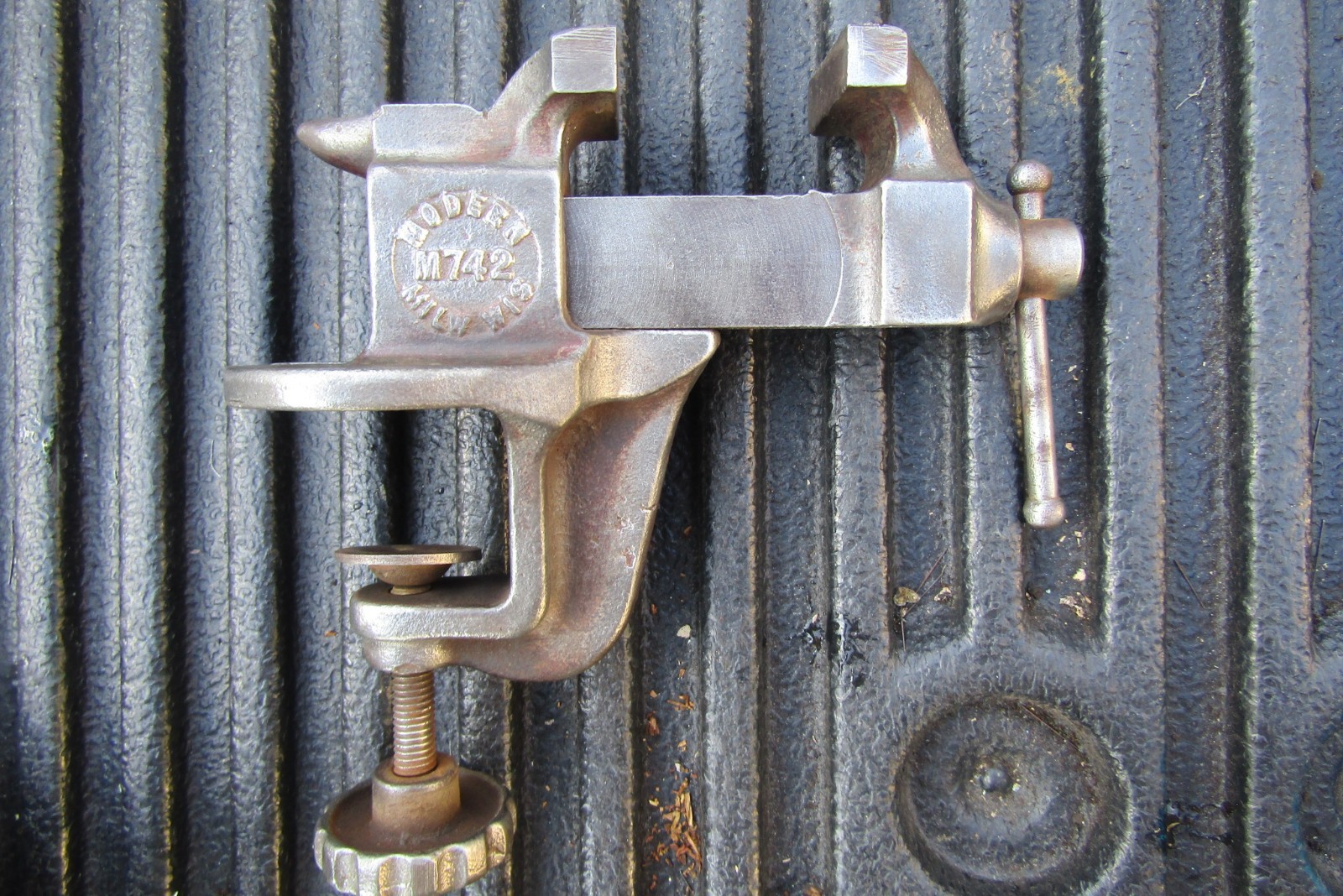 Vintage Modern M742 clamp-on bench vise with a built-in anvil,