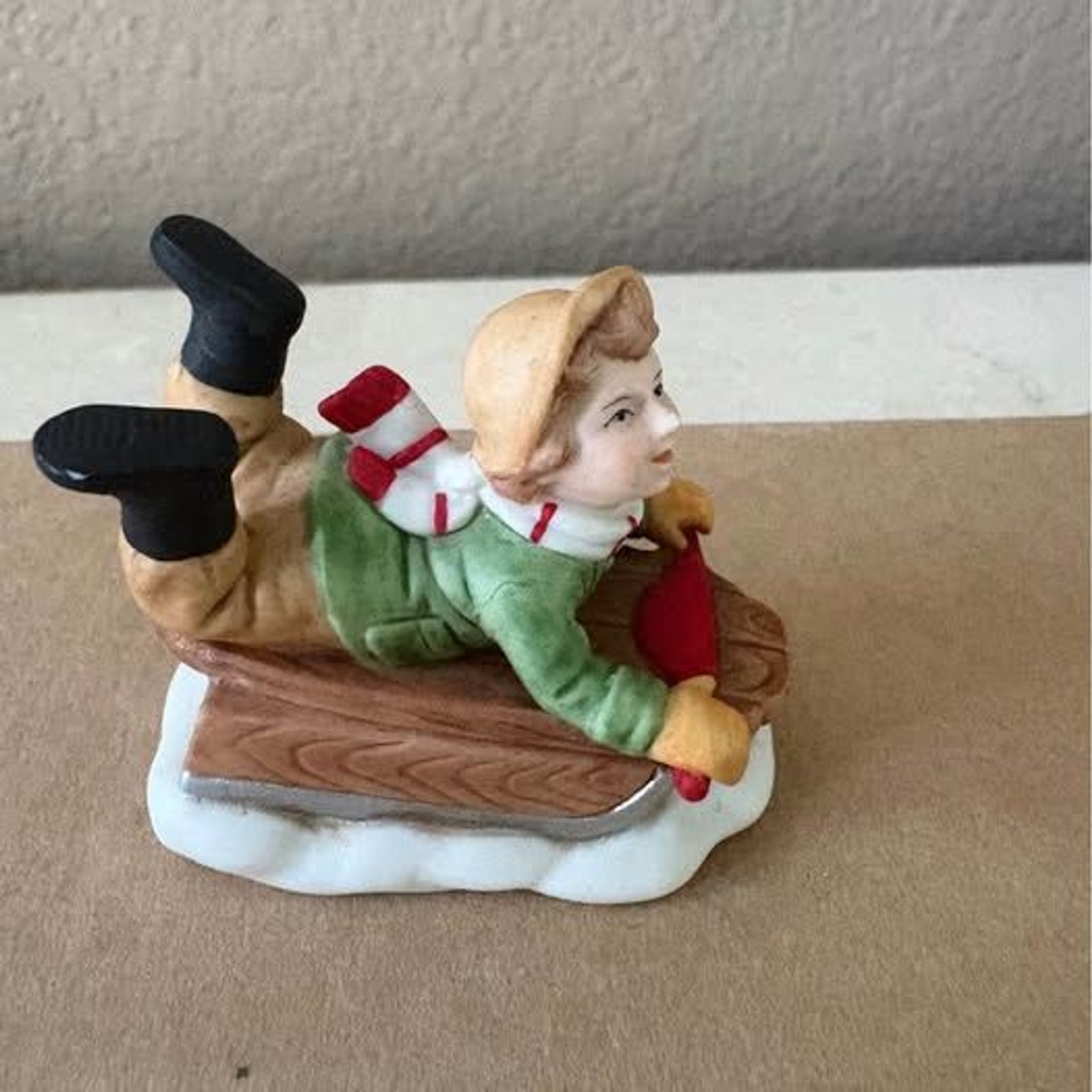 Geo. Z. Lefton Colonial Village Tommy Reid Sledding figurine #00657 (u14-6)