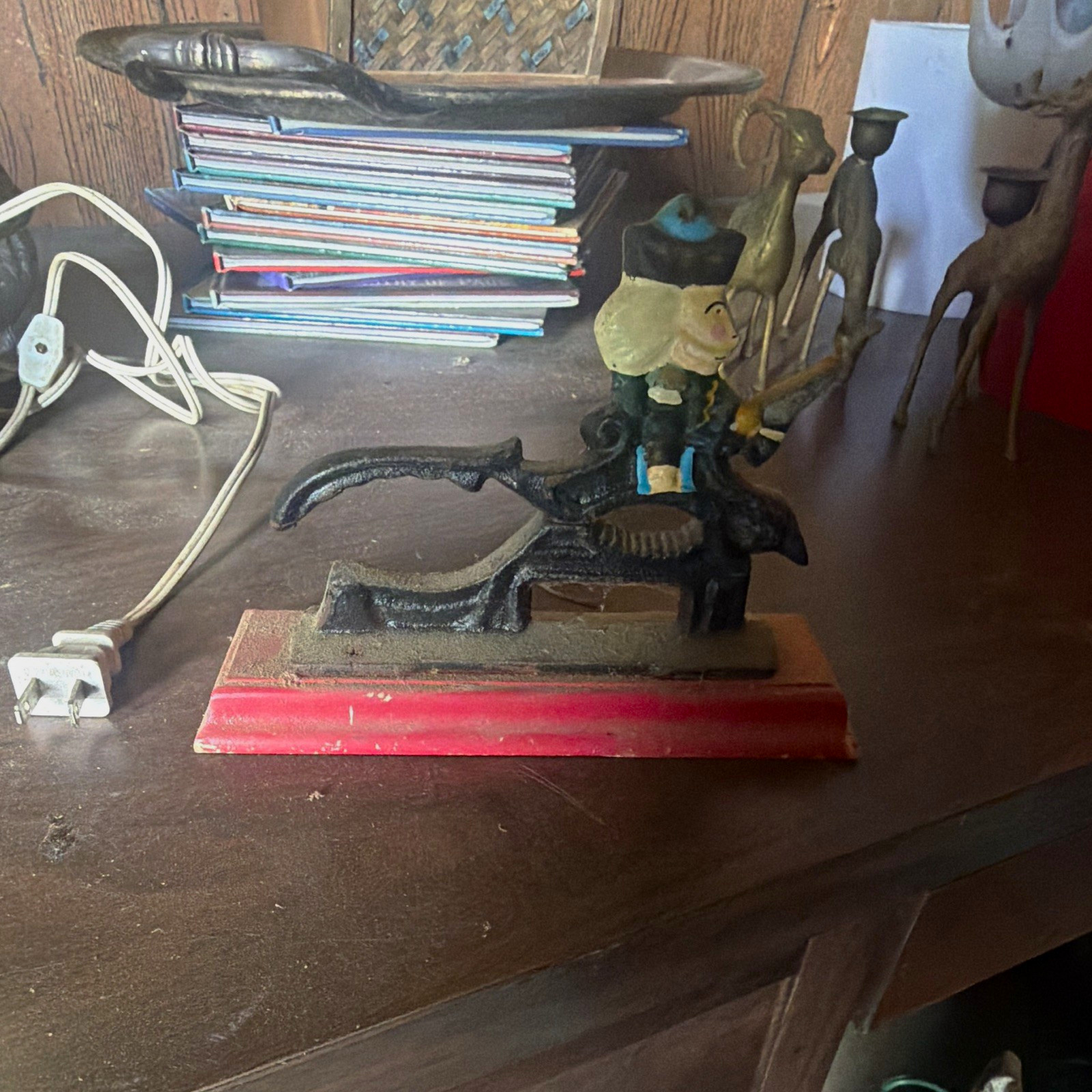 Cast Iron Figural Lever Nutcracker Tool on Red Base Tabletop Figurine
