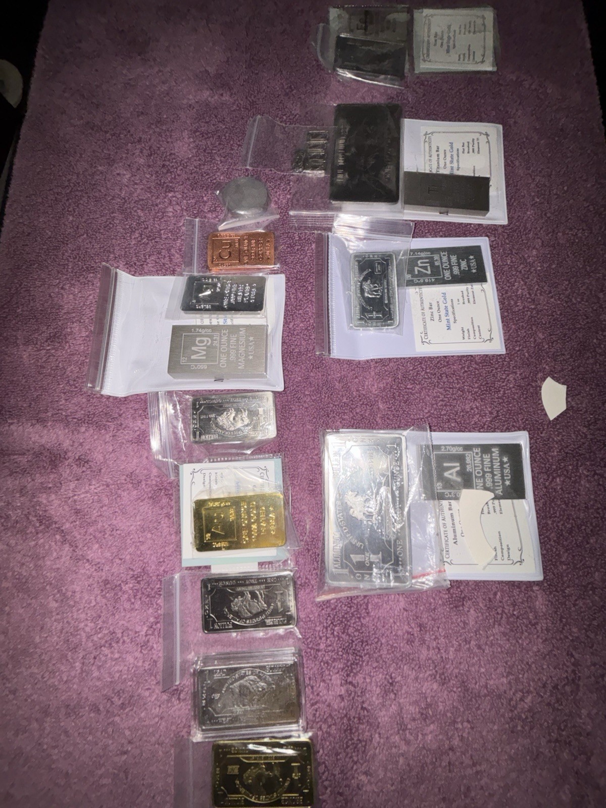 Non Precious Metal Bullion:  17 one ounce bars & 5 half gram bars. Sold as a set