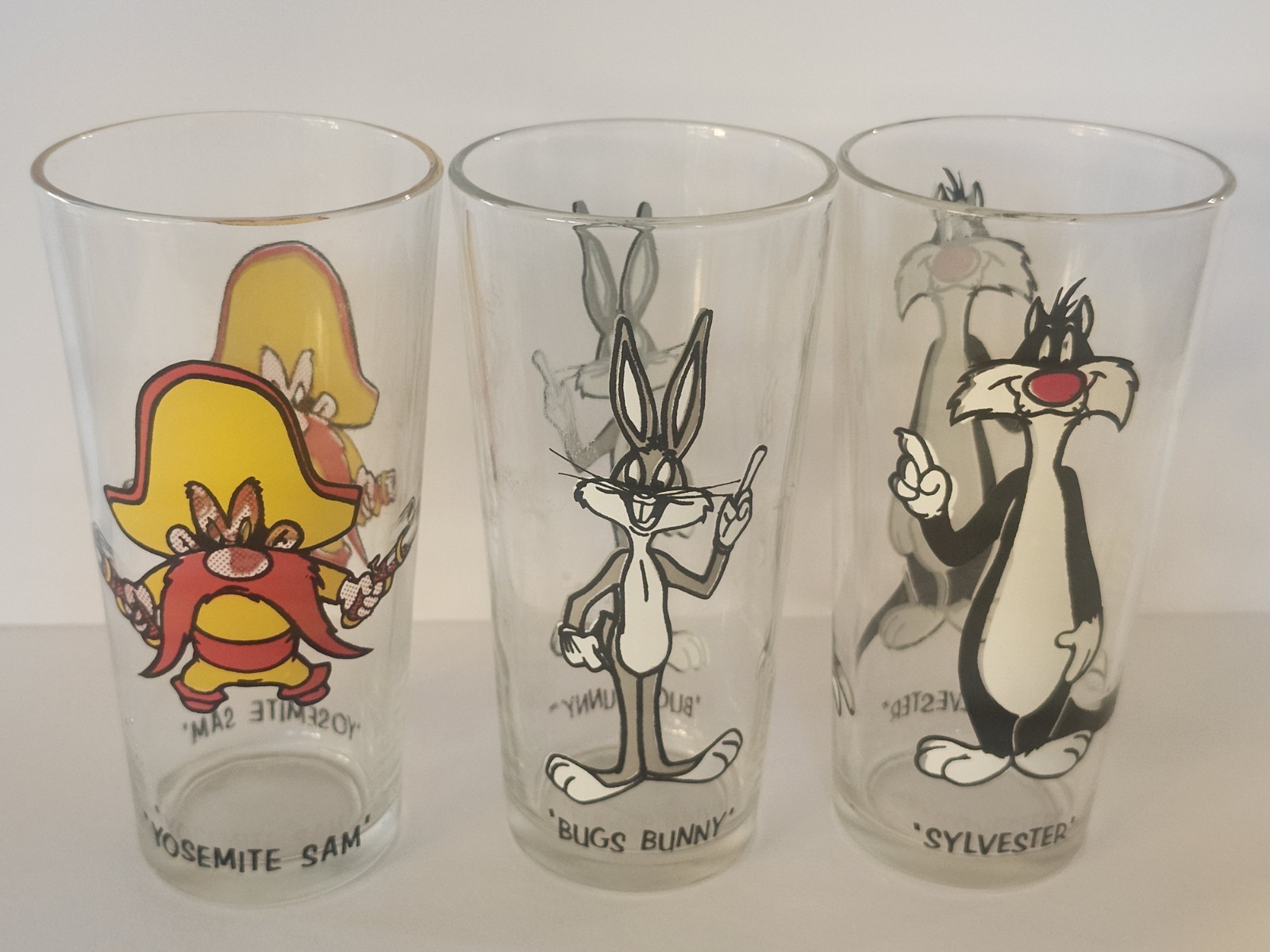THREE VINTAGE 1973 PEPSI SERIES GLASSES  YOSEMITE  SAM  SYLVESTER  BUGS BUNNY