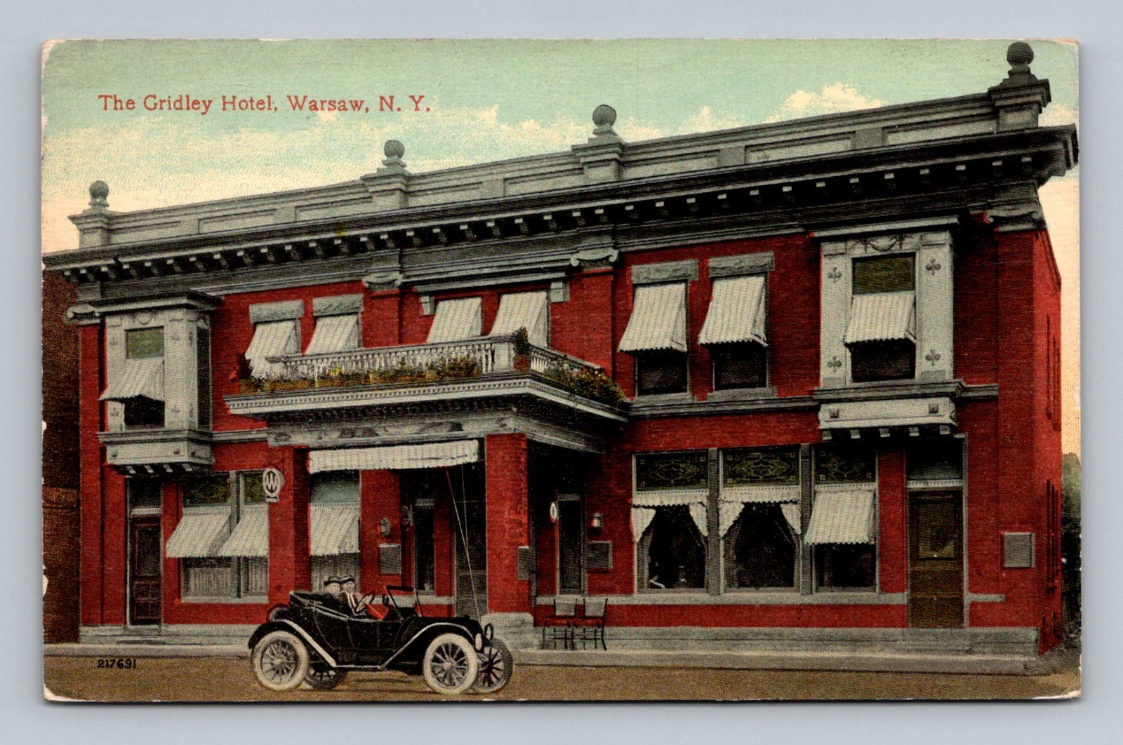 Postcard NY Warsaw New York The Gridley Hotel Building vintage car