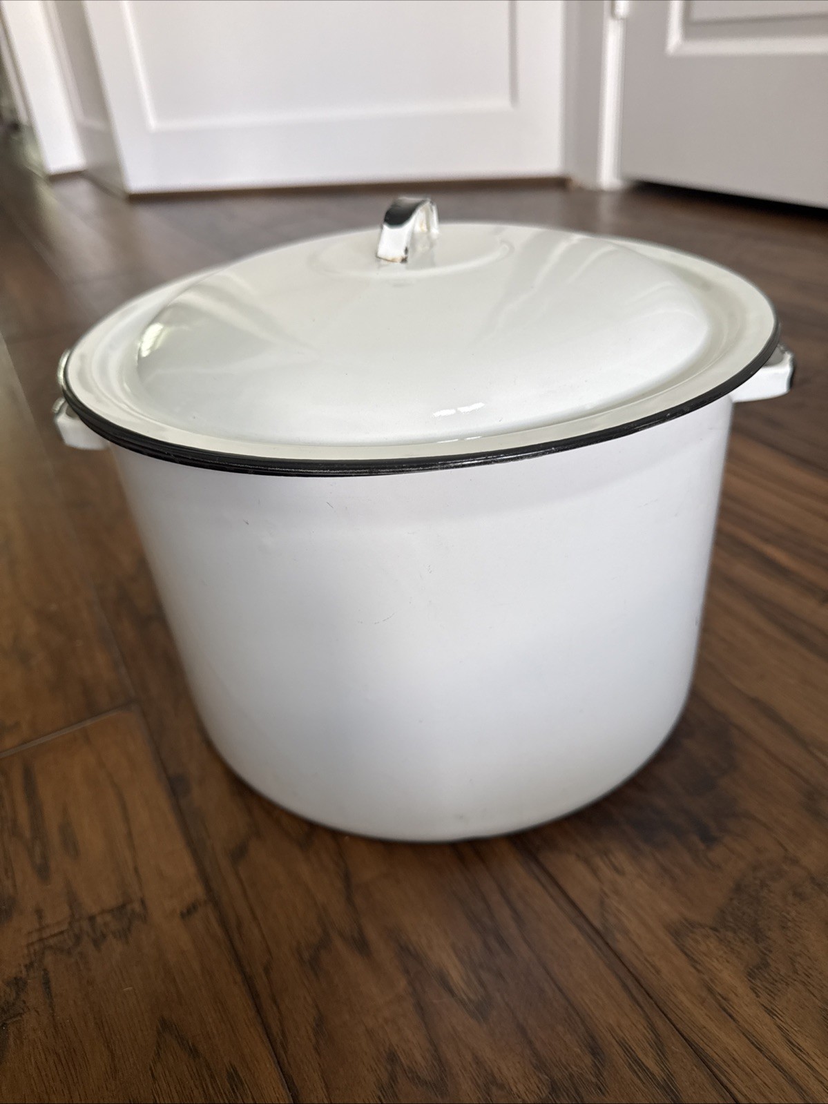 Vintage White Enamelware stock pot Classic black-trimmed rim.