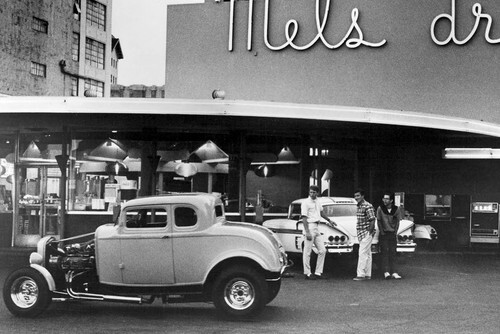 American Graffiti Milner's '32 Ford Toad's '58 Chevy at Mel's 24x36 Poster American Graffiti Milner's '32 Ford Toad's '58 Chevy at Mel's 24x36 Poster