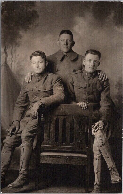 1910s Studio RPPC Photo Postcard Three Affectionate Young Soldiers with Cigars