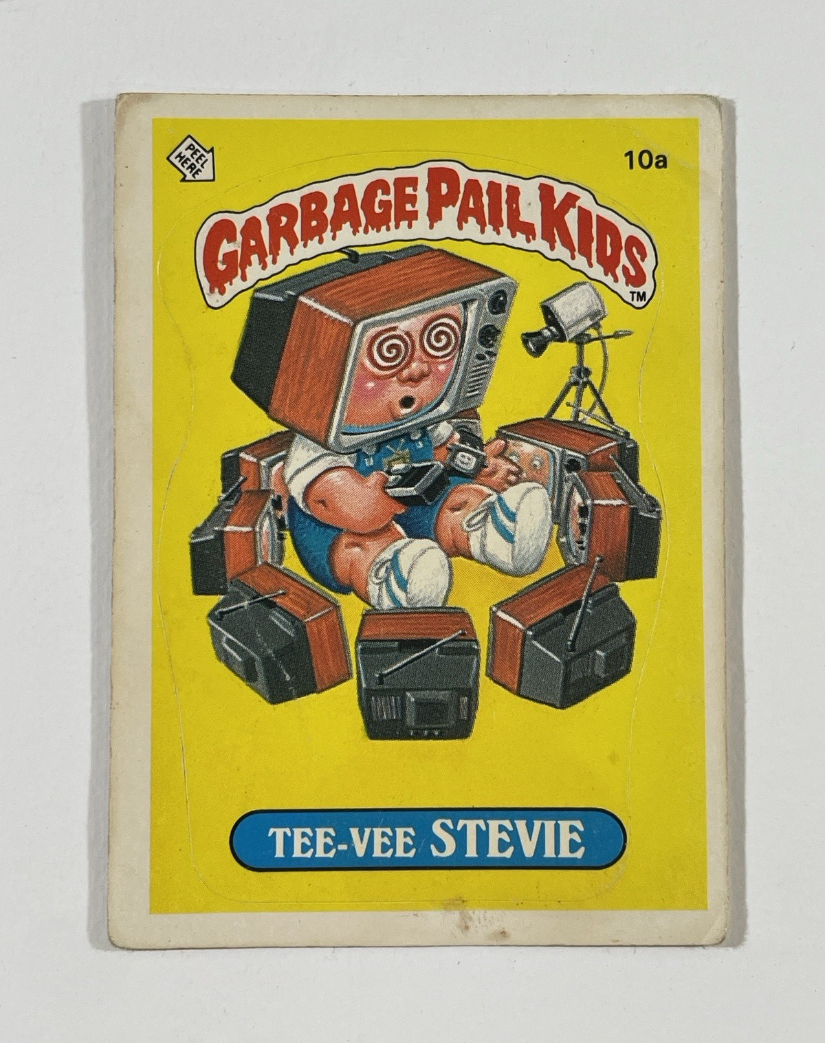 Topps 1985 Garbage Pail Kids Series 1 #10a Tee-Vee Stevie Sticker Card Matte