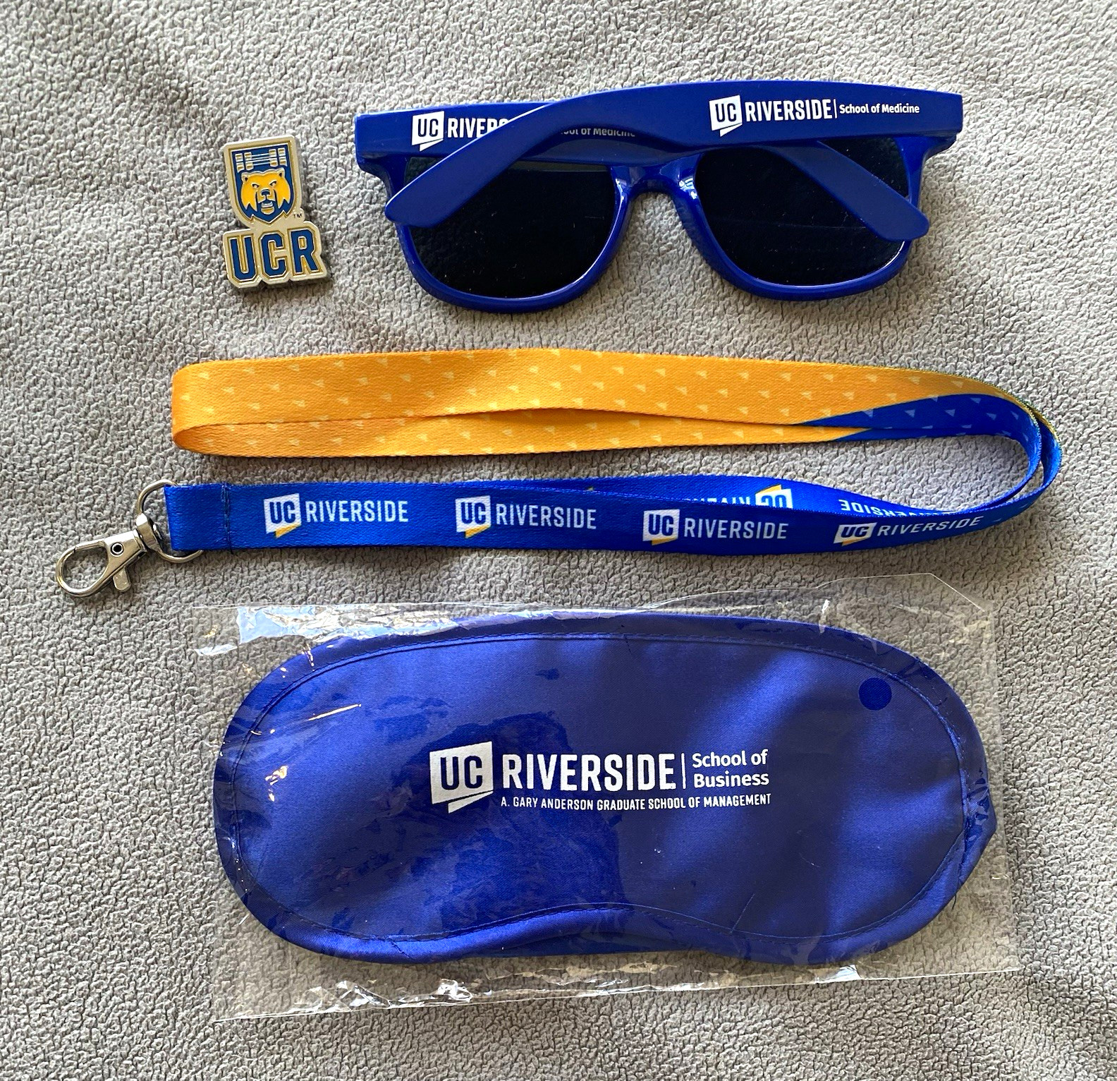 UC Riverside Bundle - UCR Bear Logo Lapel Pin, Lanyard, Blue Sunglasses and Mask UC Riverside Bundle - UCR Bear Logo Lapel Pin, Lanyard, Blue Sunglasses and Mask