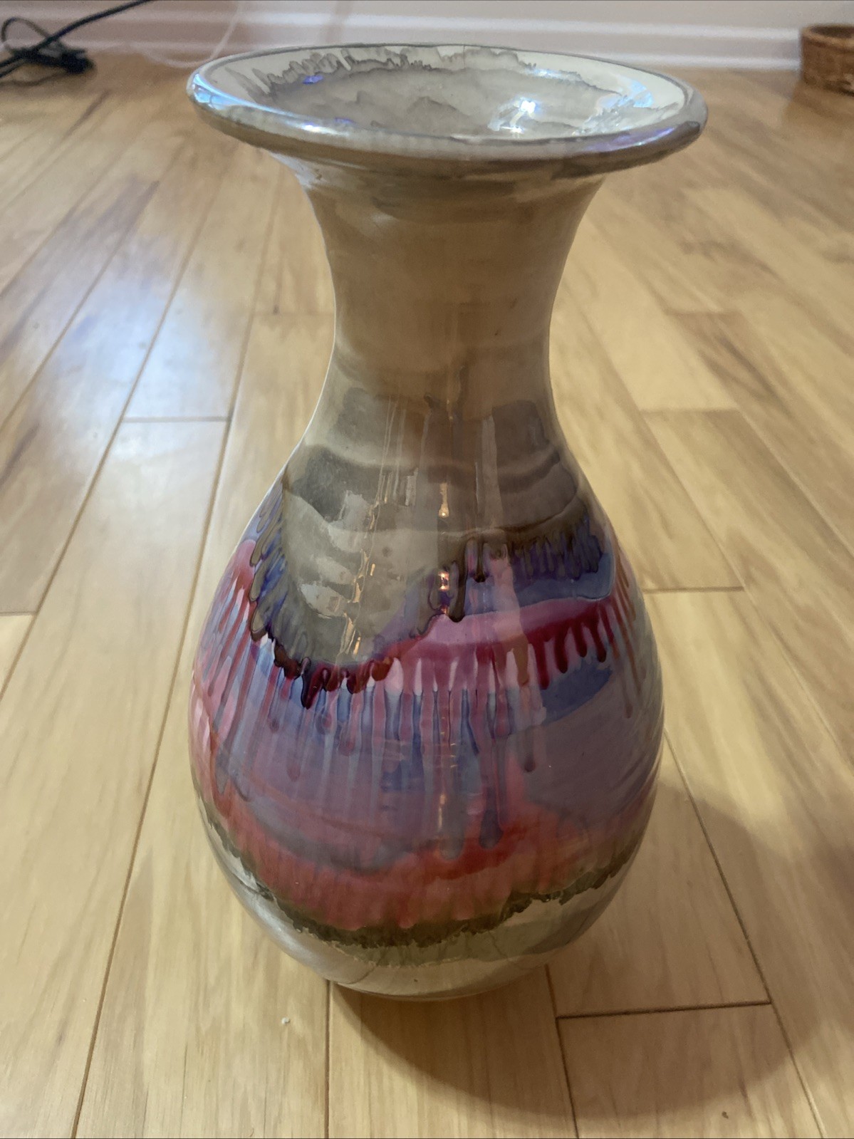 A Beautiful Hand Crafted Ceramic Vase With A Multi Color Glaze.