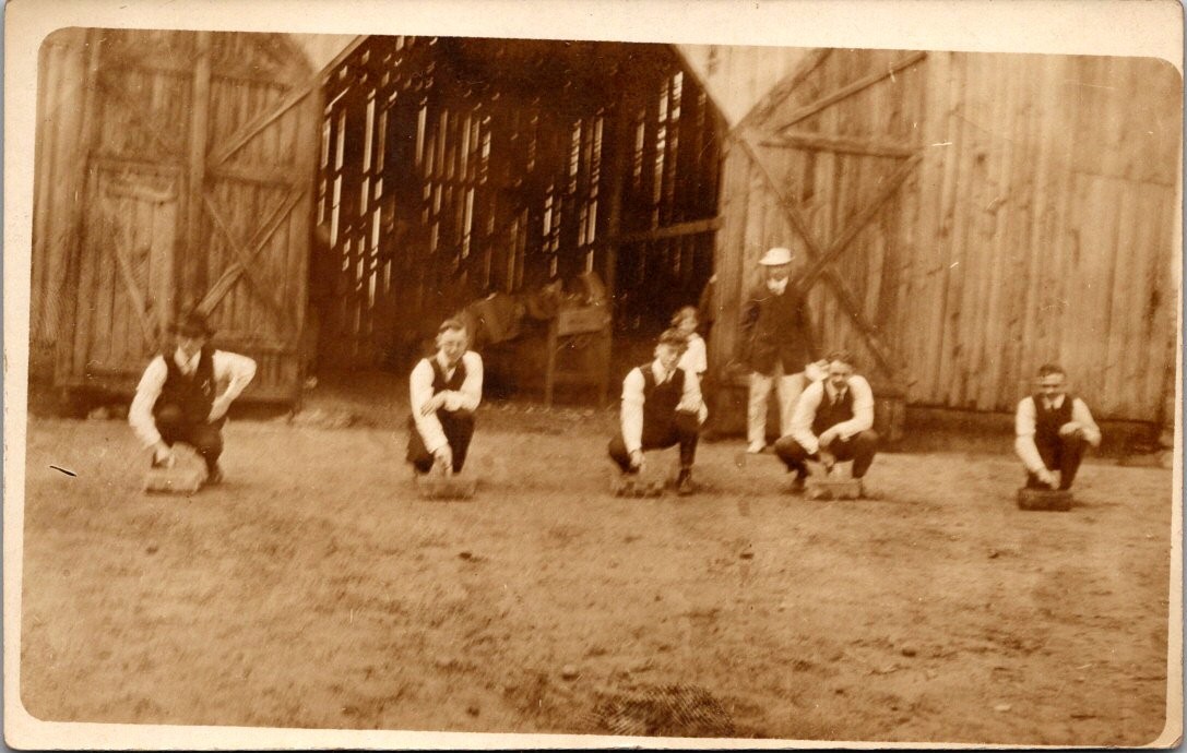 Men Playing Game Bricks Barn Building Rural Americana Postcard Real Photo RPPC Men Playing Game Bricks Barn Building Rural Americana Postcard Real Photo RPPC