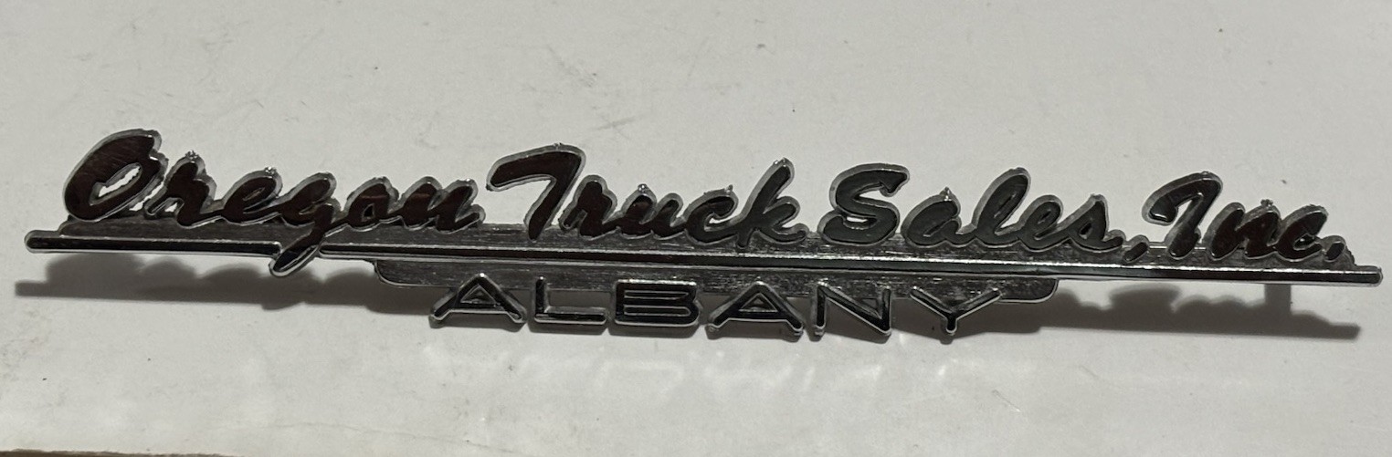 Vintage Metal Dealership Emblem - Oregon Truck Sales, Albany Oregon