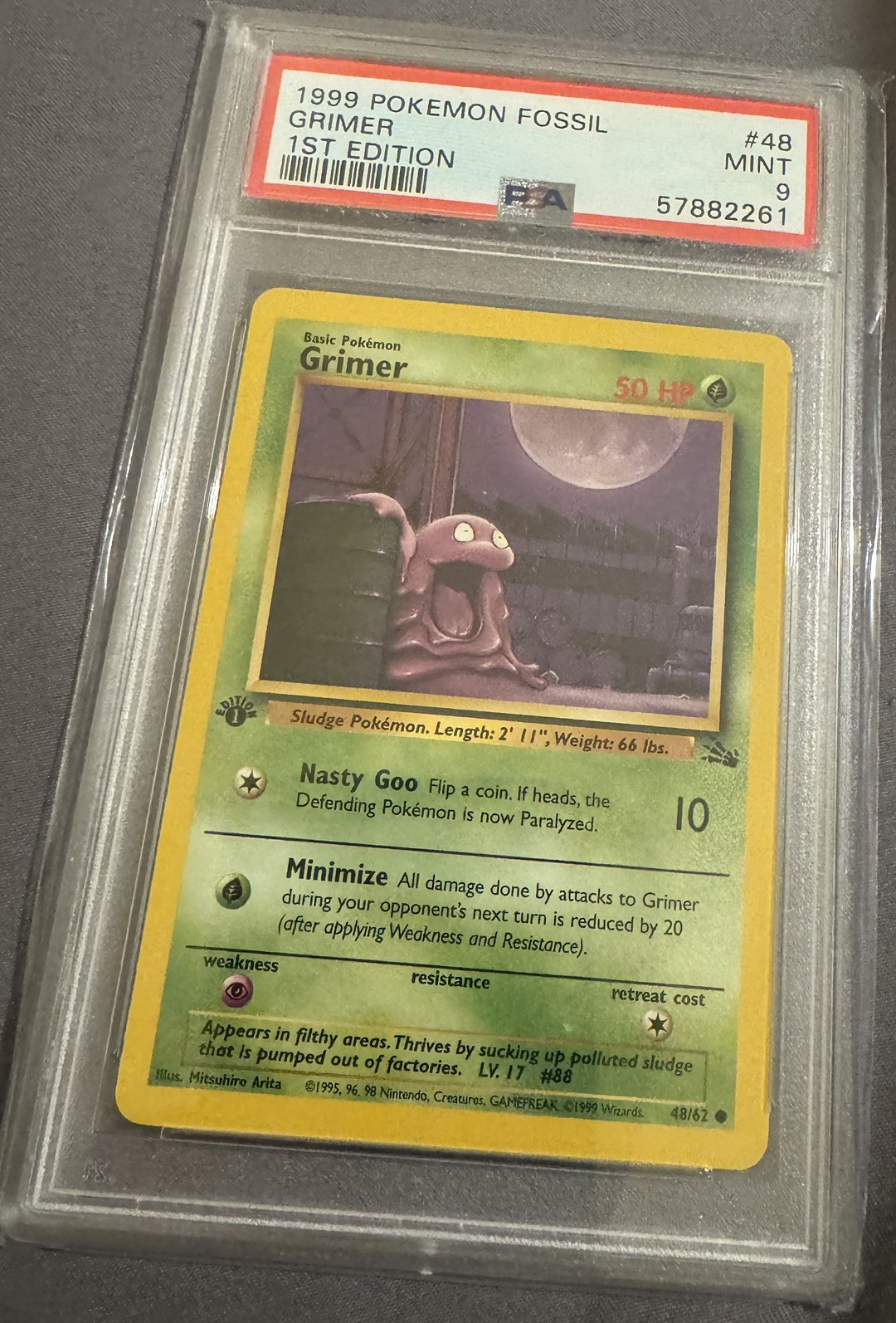 1999 Pokemon Fossil 1st Edition Grimer #48 PSA 9 Mint WOTC Graded Card Vintage