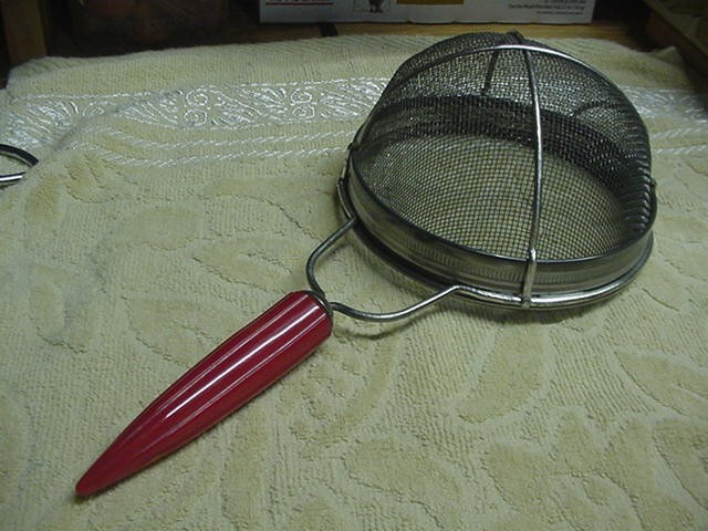 Vintage BIG Strainer/Sifter Kitchen Utensil ANDROCK bullet SHINY RED Bakelite