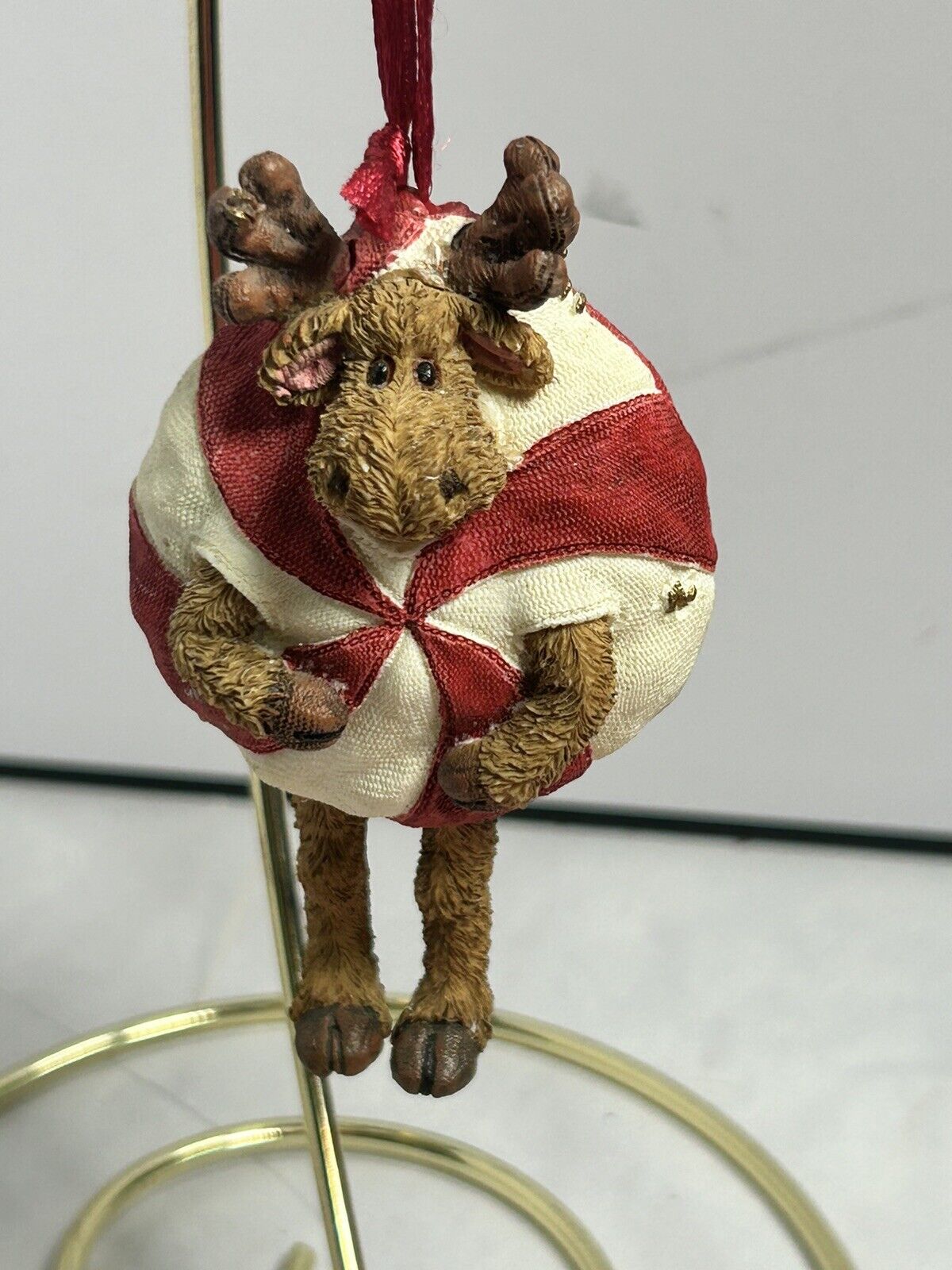 Boyds Bear Resin Christmas Ornament with Moose peeking  out of a peppermint rare