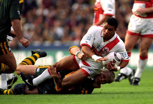 England's Jason Robinson is brought down by Australia's Geoff Toov- Old Photo England's Jason Robinson is brought down by Australia's Geoff Toov- Old Photo
