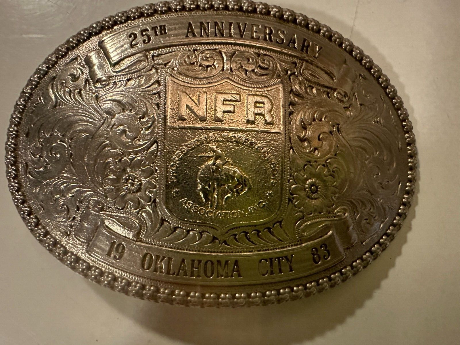 1983 NFR 25th Anniversary Trophy Belt Buckle, Gist Sterling Silver Overlay