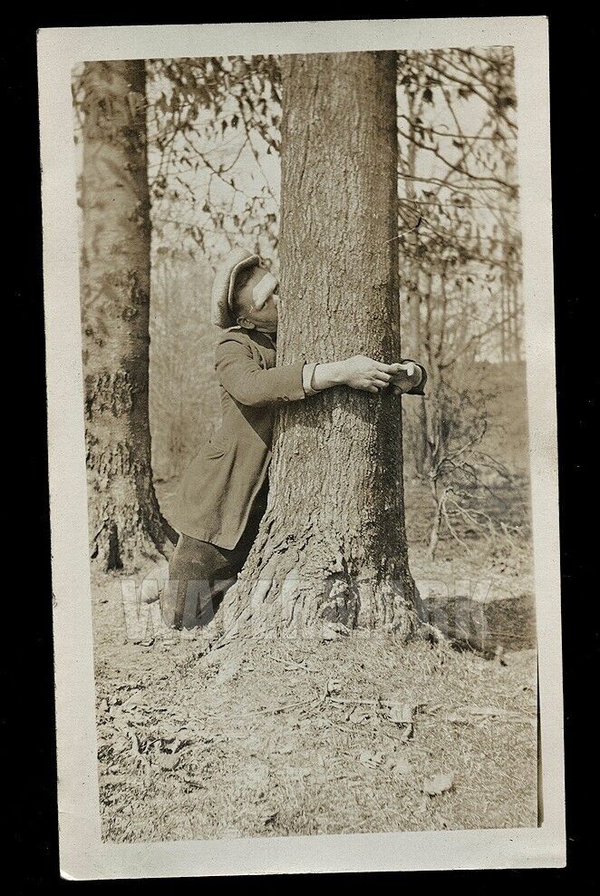 Weird 1920s Snapshot Photo Man Kissing  A Tree Bizarre Vintage Unusual