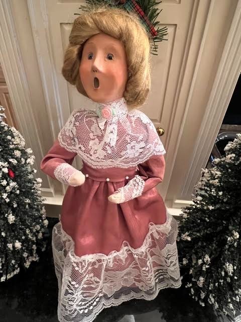 Victorian Woman Caroler w/ Pink Moire Dress w/ Lace at neck, wrists, & Hemline Victorian Woman Caroler w/ Pink Moire Dress w/ Lace at neck, wrists, & Hemline