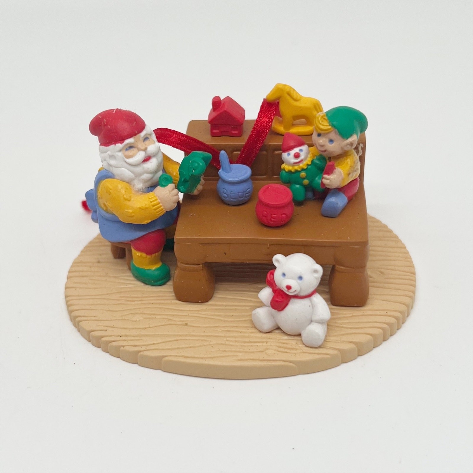 Vintage 1992 Avon Christmas With Santa Ornament in the Workshop
