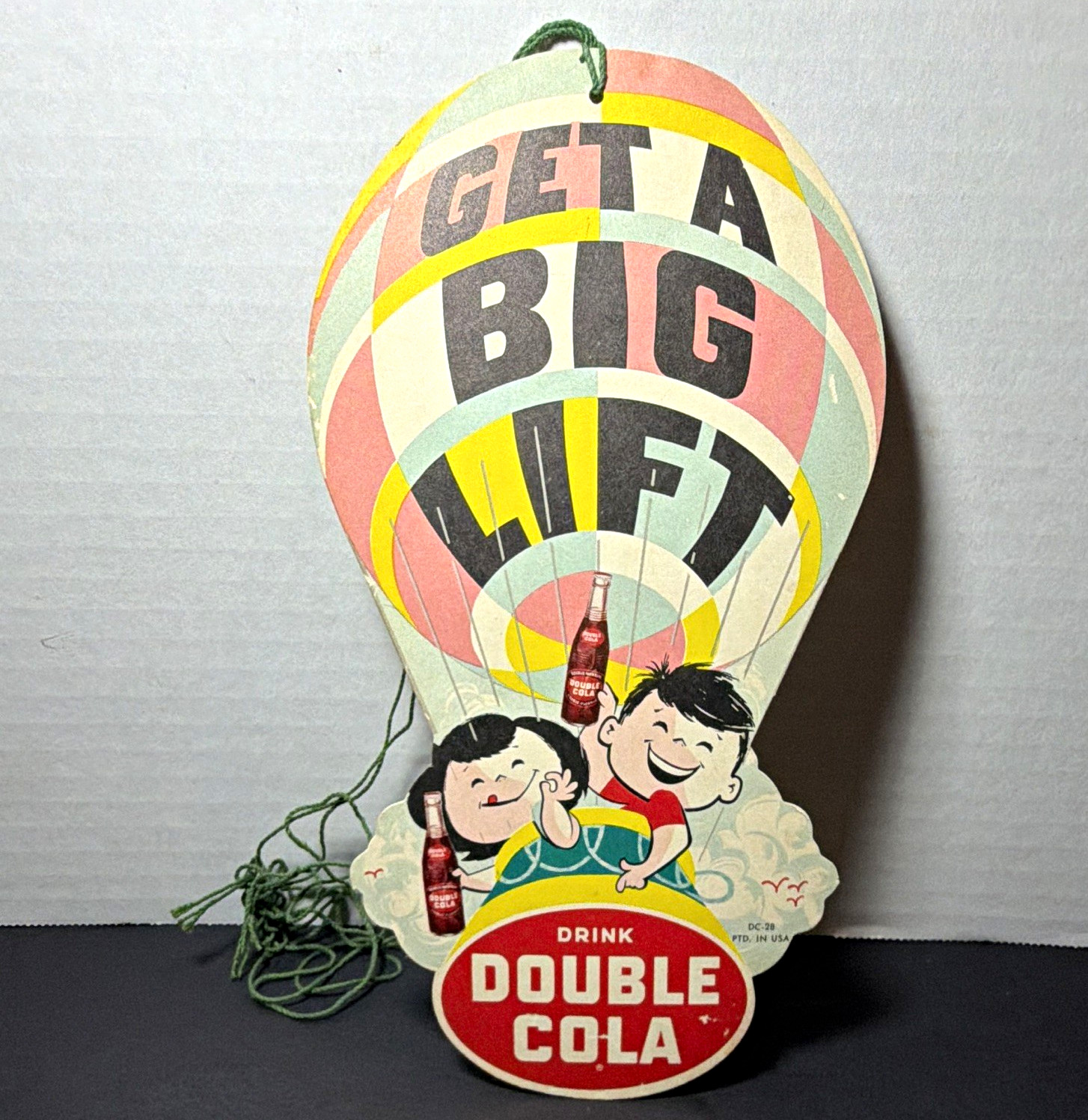 Double Cola Vintage Hanging Die-Cut Soda Sign “Get a Big Lift” DC-28 FAN PULL
