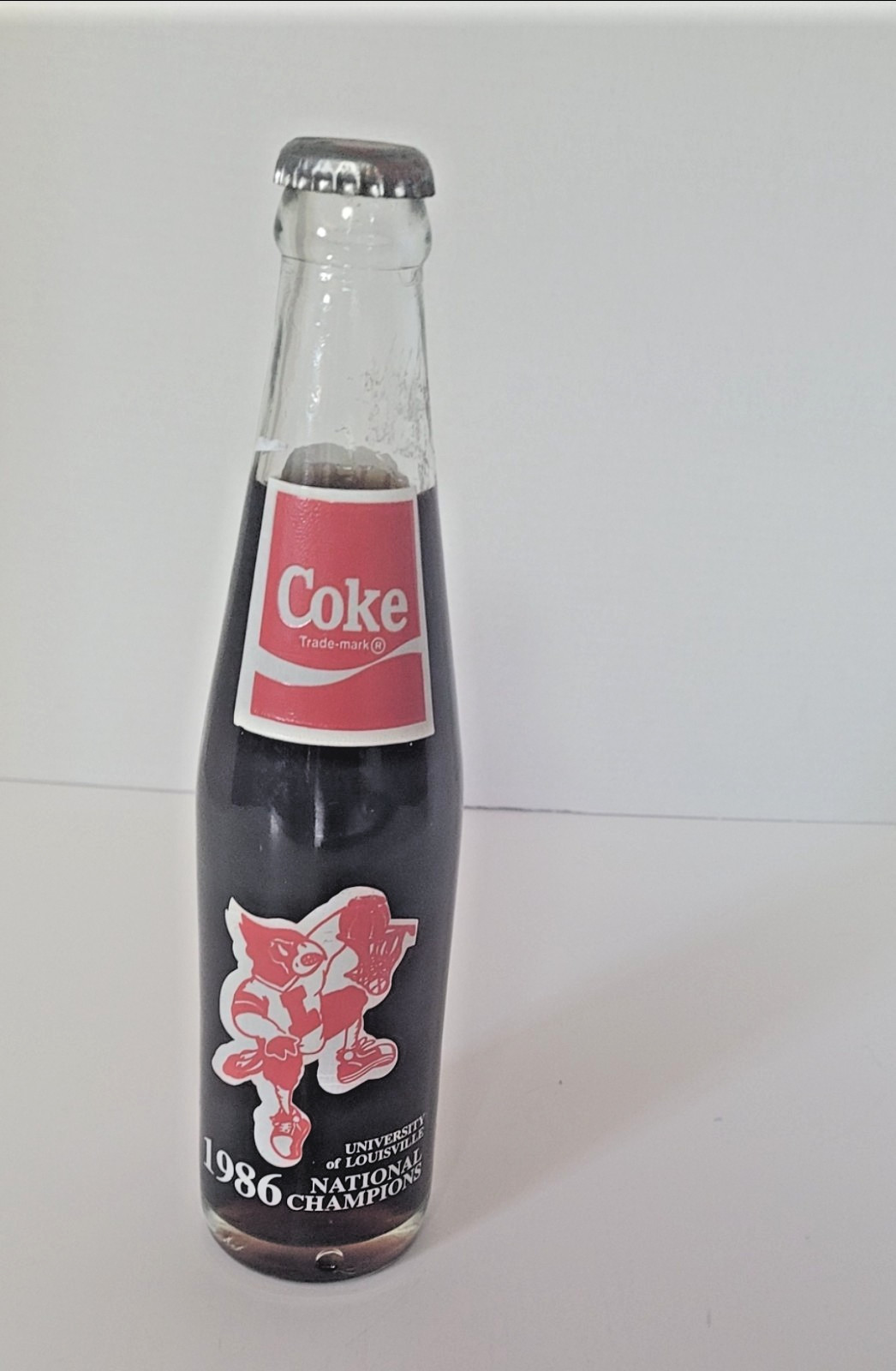 Vintage 10 oz coca cola Louisville cardinals 1986 championship bottle